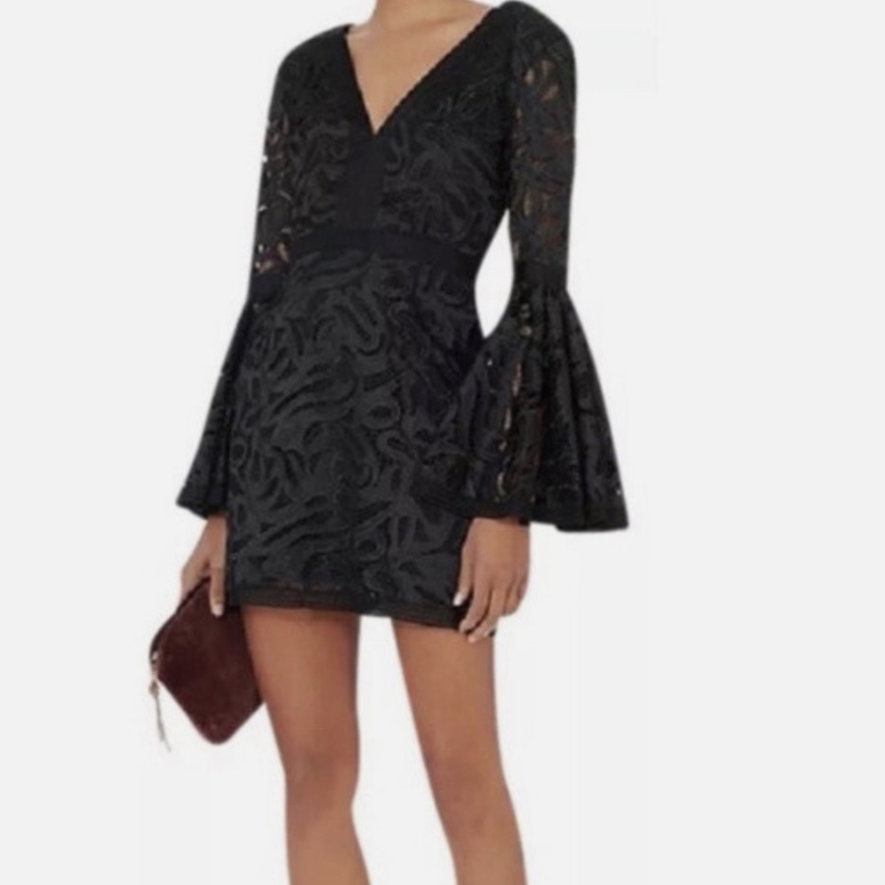 Alexis black lace mini dress with bell sleeves!